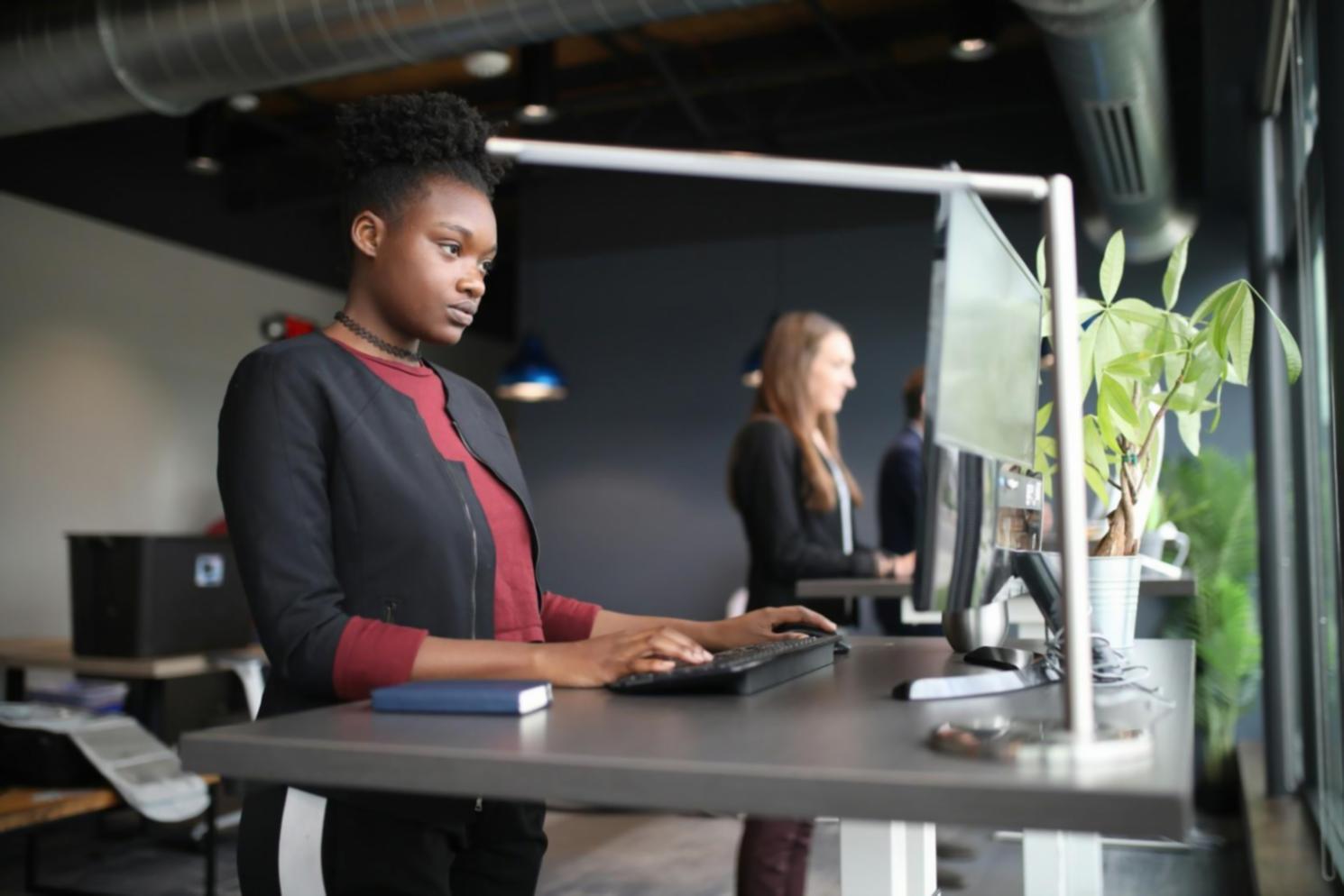 Business owner reviewing financial reports and planning strategies